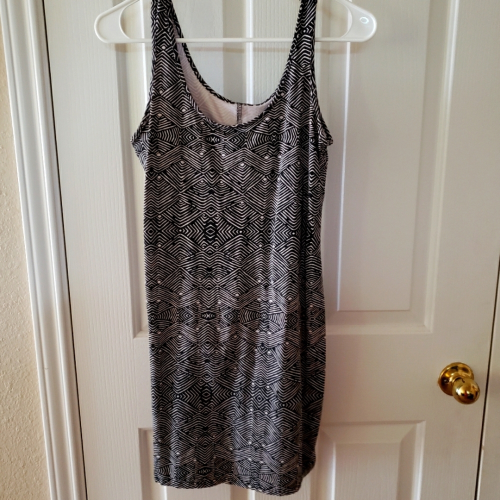 Black in white sexy body fitting mini dress. Size small
